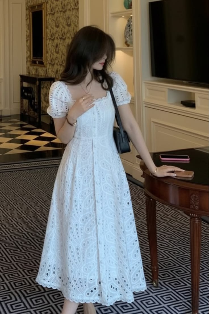 White puff-sleeve eyelet midi dress